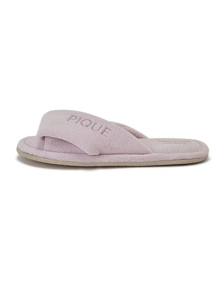 Soft pink slip-on bedroom slippers with plush pile fabric and wide strap for a cozy fit, perfect for indoor relaxation and comfort.