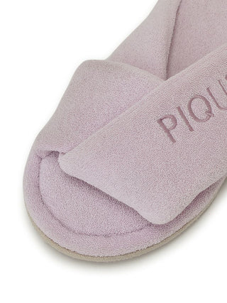 Close-up of a soft pink indoor slipper with textured pile fabric and wide strap from Gelato Pique for cozy home comfort.