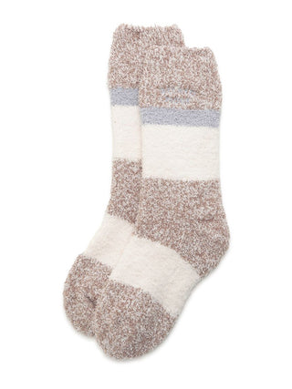Powder Melange Striped Fuzzy Socks in beige and white with cozy stripes, offering comfort and warmth for lounging and colder seasons.