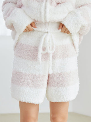 Model wearing Gelato 2 Border Lounge Shorts in plush fabric with pastel two-tone border, emphasizing comfort and style.