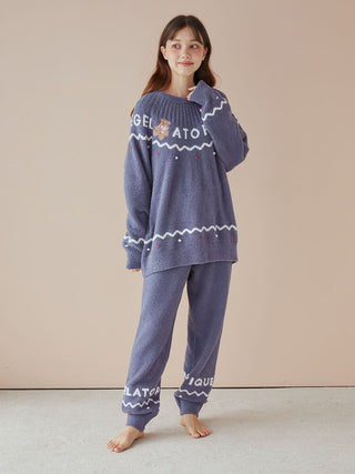 Model wearing Nordic Pajama Pants set in plush fabric with a charming Nordic-inspired design by Gelato Pique.