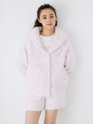 Woman wearing pink fuzzy lounge shorts and matching jacket from Gelato Pique, showcasing cozy chic loungewear fashion.