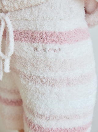 Close-up of Gelato Random Border Lounge Shorts in fluffy gelato material with pink stripes and logo embroidery on the waist.