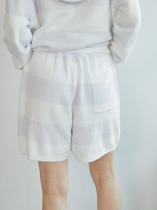 Person wearing Smoothie 2-Border Lounge Shorts by Gelato Pique USA, showcasing cozy and stylish premium loungewear.
