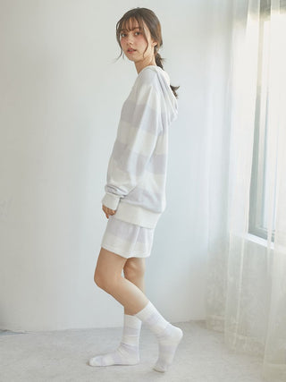 Woman wearing Smoothie 2-Border Lounge Shorts by Gelato Pique, featuring cozy and stylish loungewear for premium everyday comfort.