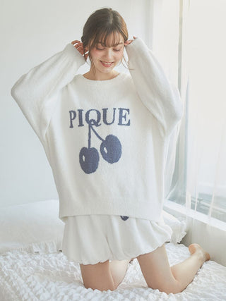 Model wearing Air Moco Cherry Jacquard Balloon Lounge Shorts and matching Pique sweater, showcasing cozy loungewear style.