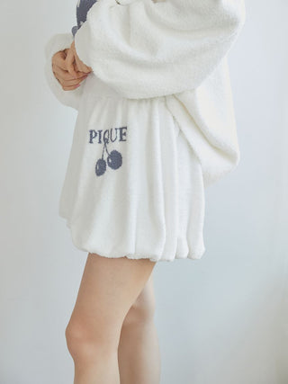 Model wearing Gelato Pique USA Air Moco Cherry Jacquard Balloon Lounge Shorts in a plush white fabric with embroidered cherry design.