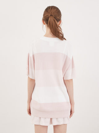 Back view of woman wearing Smoothie Lite striped short-sleeved pullover in light pink and white, showcasing the relaxed fit and summer style.