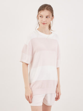 Model wearing Smoothie Lite 3 Striped Short-Sleeved Pullover from Summer Serenity Collection, featuring soft pink gradient, boxy silhouette.