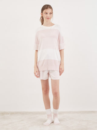 Woman wearing Smoothie Lite 3 Striped Short-Sleeved Pullover from the Summer Serenity collection for summer comfort and style.