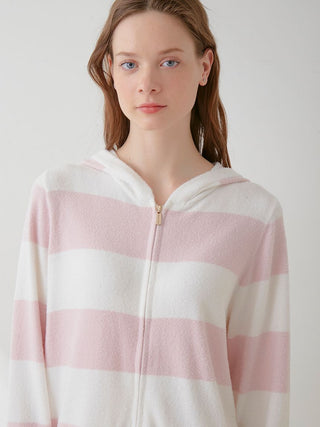 Model wearing Smoothie Lite 2-Border Zip Up Hoodie Cardigan in pastel pink and white stripes, front view.