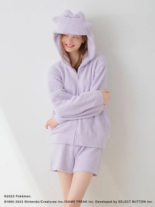 Woman wearing Pokémon Sleep Baby Moco Ditto Hoodie & Shorts Set, featuring a playful design in soft lavender.