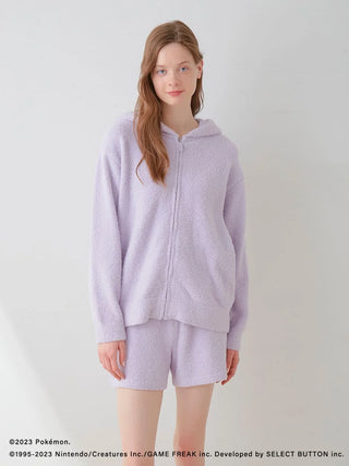 Woman wearing Pokémon Sleep Baby Moco Ditto Hoodie & Shorts Set in lavender, cozy loungewear.