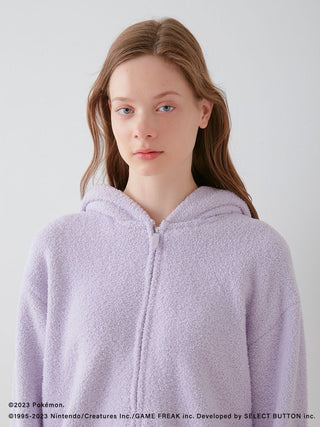 Woman wearing Pokémon Sleep Baby Moco Ditto Hoodie, soft purple, cozy loungewear.