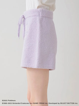 Side profile of Pokémon Sleep Baby Moco Ditto purple shorts, featuring a cozy texture and stylish tie waistband.