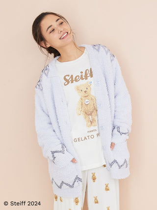 Model wearing Steiff Fair Isle Pattern Fuzzy Cardigan with bear print shirt, demonstrating cozy and stylish fashion look.