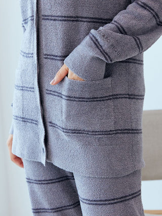 Close-up of a gray striped Hot Smoothie Border Cardigan by Gelato Pique, showcasing soft fabric and front pocket detail.
