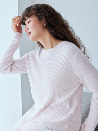 Woman wearing Hot Smoothie Rib Pullover Sweater, soft pink, cozy loungewear by Gelato Pique, textured and heat-retentive fabric.