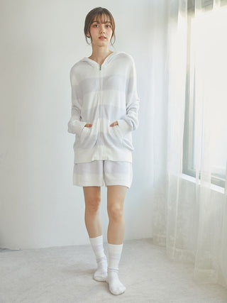 Woman wearing Smoothie 2-Border Zip-Up Hoodie from Gelato Pique USA, showcasing cozy loungewear with classic striped design.