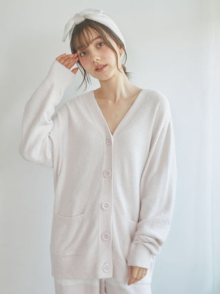 Alt Tag: Woman wearing a cozy Smoothie Button-Up Cardigan made from plush Smoothie fabric, perfect for lounging and everyday wear.
