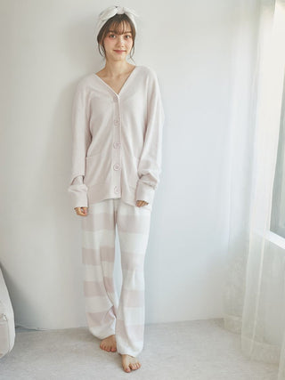 Woman wearing Smoothie Button-Up Cardigan from Gelato Pique USA, showcasing cozy lounge wear with classic style.