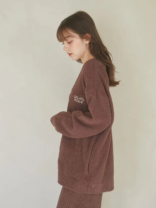 Model wearing Babymoco Chocolate Button-Up Cardigan from Gelato Pique USA, showcasing its softness and rich chocolate color.