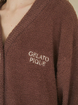 Babymoco Chocolate Button-Up Cardigan close-up showing Gelato Pique logo and cozy fabric texture.