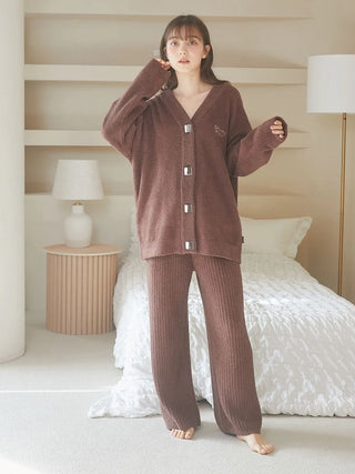 Woman wearing Babymoco Chocolate Button-Up Cardigan in a cozy room setting.