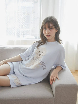 Woman wearing a Gelato Pique USA Toy Poodle Relax Fit T-Shirt, showcasing premium loungewear with a cute dog design.
