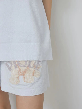 Close-up of Gelato Pique USA's toy poodle knit pullover and shorts set, showcasing premium loungewear and sleepwear design.