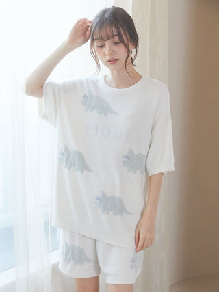 Woman in Smoothie Dinosaur Pullover & Shorts Loungewear, cozy and playful set by Gelato Pique USA, featuring dinosaur motif.