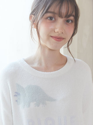 Woman wearing Smoothie Dinosaur Pullover from Gelato Pique, featuring a soft fabric and cute dinosaur motif.