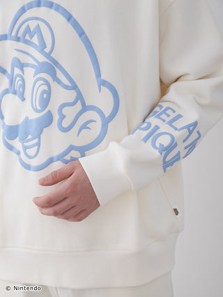 Close-up of a unisex fleece pullover featuring a large puff print of Mario and logo on the sleeve, made of soft, thick cotton fabric.