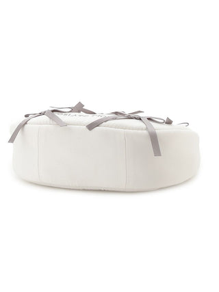 Elegant round ribbon handle pouch in white, featuring smooth matte fabric with a minimalist design for a luxurious feel.