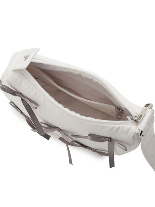 Elegant Gelato Pique ribbon handle pouch with open interior view, showcasing its sleek design and luxurious matte fabric.