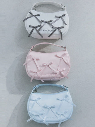 Elegant Gelato Pique Ribbon Handle Pouches in white, pink, and blue with a modern rounded design and minimalist bow details.