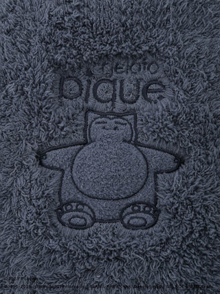 Close-up of fuzzy Snorlax design on men's GELATO Pokémon Sleep hoodie and shorts set.