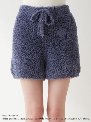 GELATO Snorlax fleece shorts featuring Pokémon Sleep design in dark blue with Snorlax embroidery detail, cozy and plush.