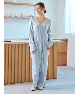 Woman wearing Thermal Smoothie Long Cardigan with ribbed texture, showcasing cozy chic style for elegant layering indoors.