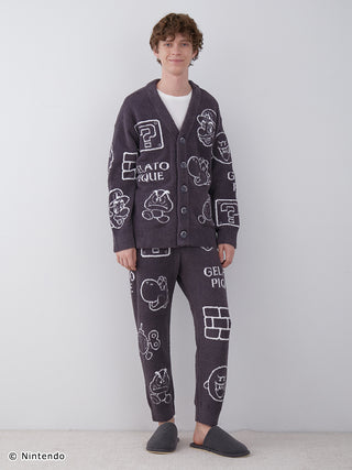 Model wearing Super Mario™️ Baby Moco Cardigan with character pattern, featuring soft and fluffy jacquard fabric.