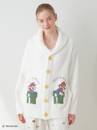 Model wearing Super Mario™️ Baby Moco Jacquard Shawl Cardigan, featuring soft fluffy material and colorful design.