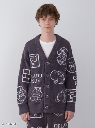 Man wearing Super Mario themed Baby Moco jacquard cardigan with character patterns.