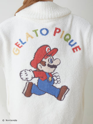 Back view of white Super Mario Baby Moco Jacquard Shawl Cardigan featuring colorful Mario embroidery and 'Gelato Pique' text.