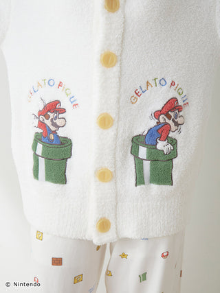 Unisex Baby Moco Super Mario cardigan with soft fabric and colorful Mario design, featuring decorative buttons.