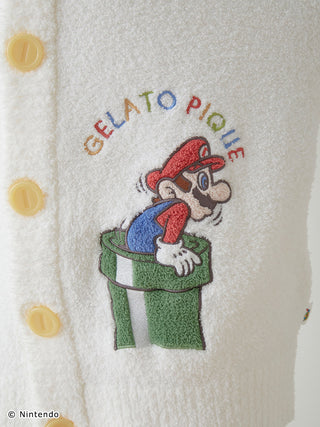 Close-up of a Super Mario embroidered design on a fluffy Baby Moco cardigan with colorful text 'Gelato Pique' above it.
