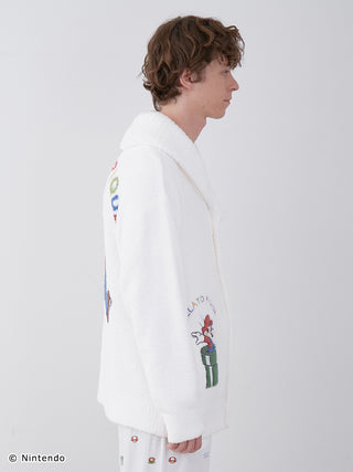 Side view of a unisex Baby Moco Jacquard Shawl Cardigan featuring Super Mario design, showcasing soft and fluffy knit material by Nintendo.