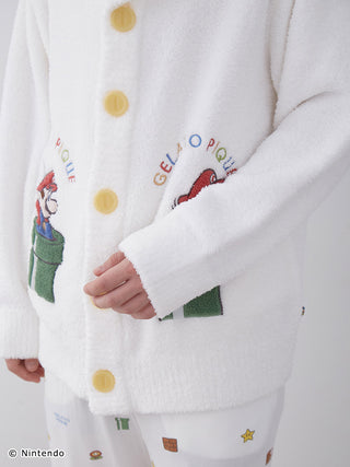 Super Mario unisex Baby Moco shawl cardigan with yellow buttons and Mario embroideries, featuring soft fluffy knit material.