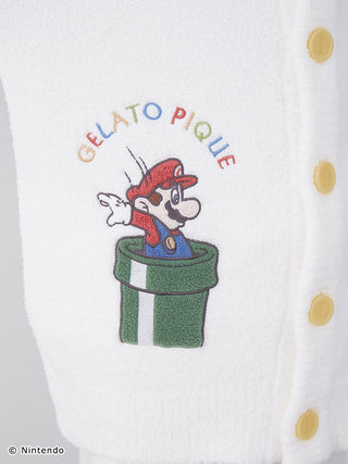 Super Mario embroidered on white Baby Moco Jacquard shawl cardigan by Gelato Pique, featuring colorful buttons and soft fabric.
