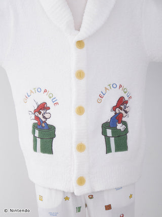 Super Mario Baby Moco shawl cardigan featuring Mario graphics, soft white fabric, and colorful buttons by Gelato Pique.