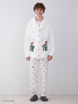 Model wearing SUPER MARIO™️ UNISEX Baby Moco Jacquard Shawl Cardigan showcasing soft, fluffy Baby Moco material with Mario design.